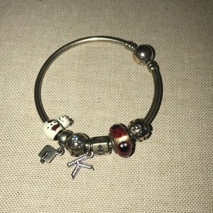 Pandora bracelet with 5 charms!!
